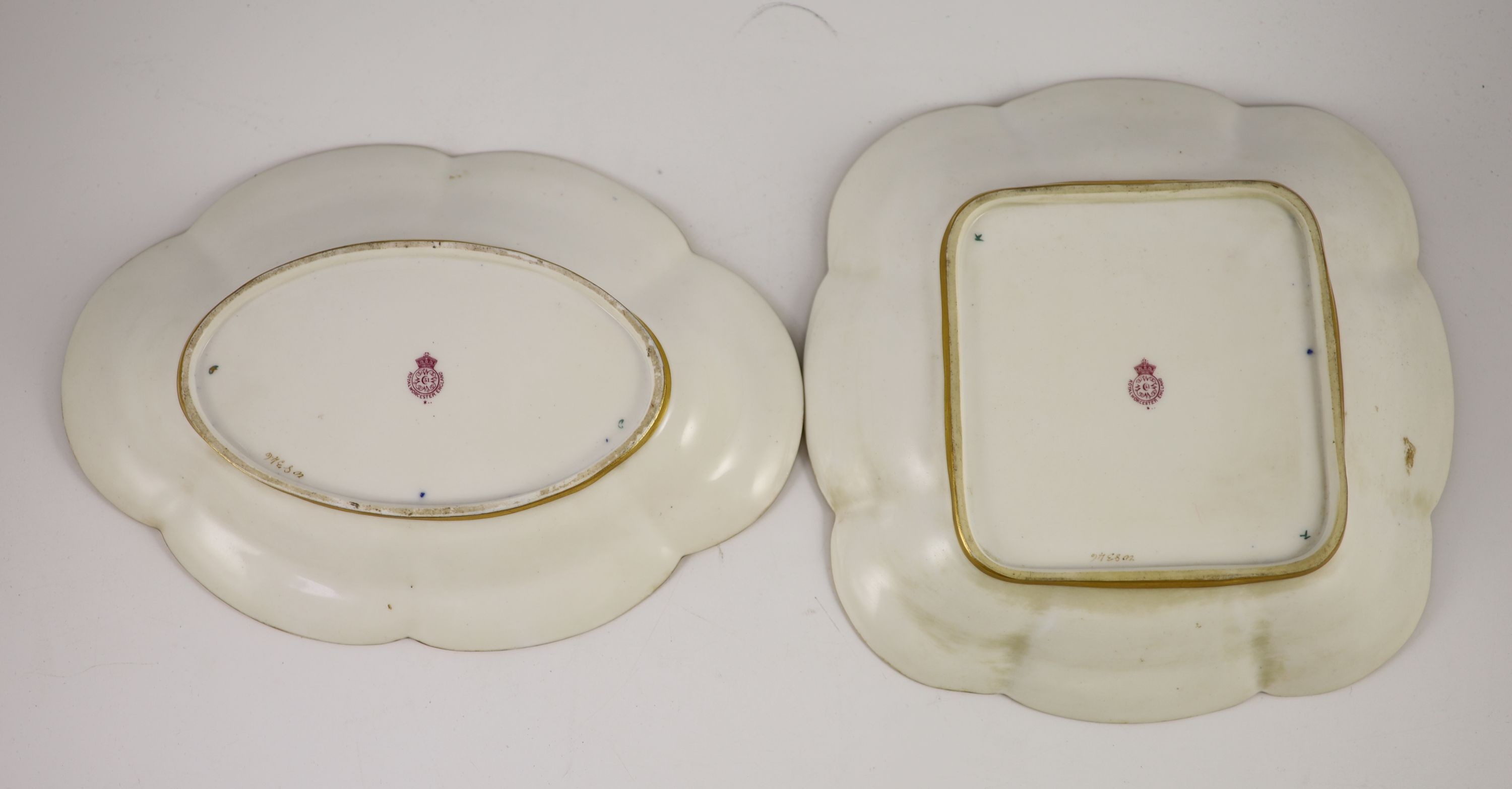 Two Royal Worcester fruit painted dessert dishes, signed E. Phillips, c.1918, 24cm and 27.5cm
